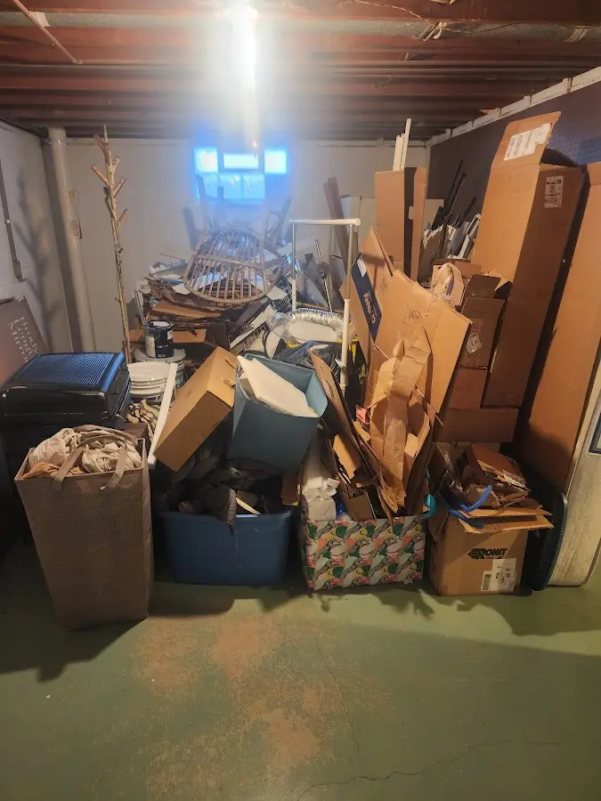 Roll-off dumpster container at job site for 2 Yard Dumpster Rental in Conneaut